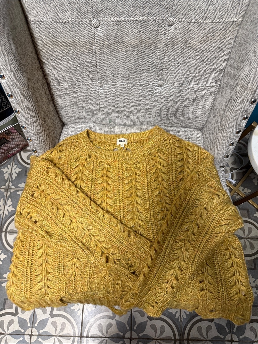 Buckle asymmetrical sweater
